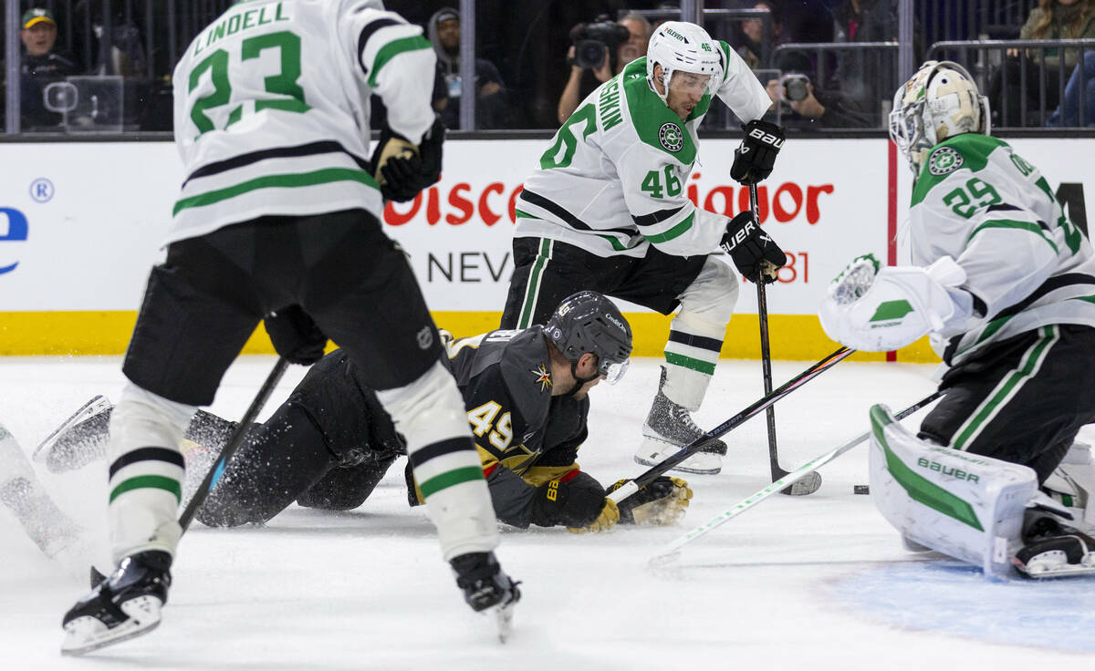 Golden Knights center Ivan Barbashev (49) is taken down but no penalty called as Dallas Stars d ...