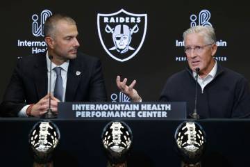 The new Raiders head coach Pete Carroll speaks as new general manager John Spytek looks on duri ...