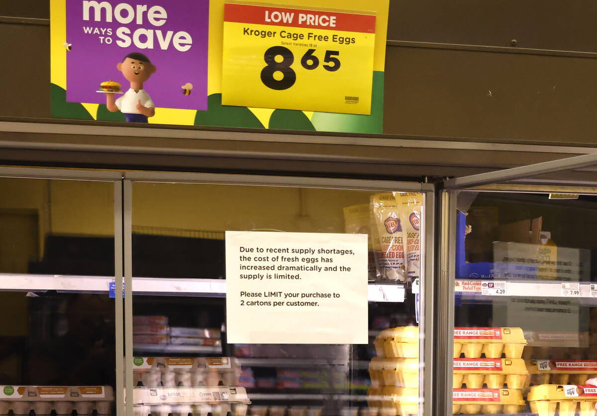 Signs notifying a supply shortage of fresh eggs and egg price are posted in the egg section at ...