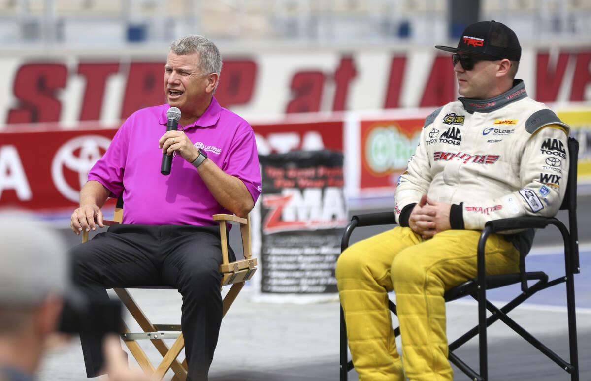 Las Vegas Motor Speedway president Chris Powell, left, talks about the new track alongside driv ...