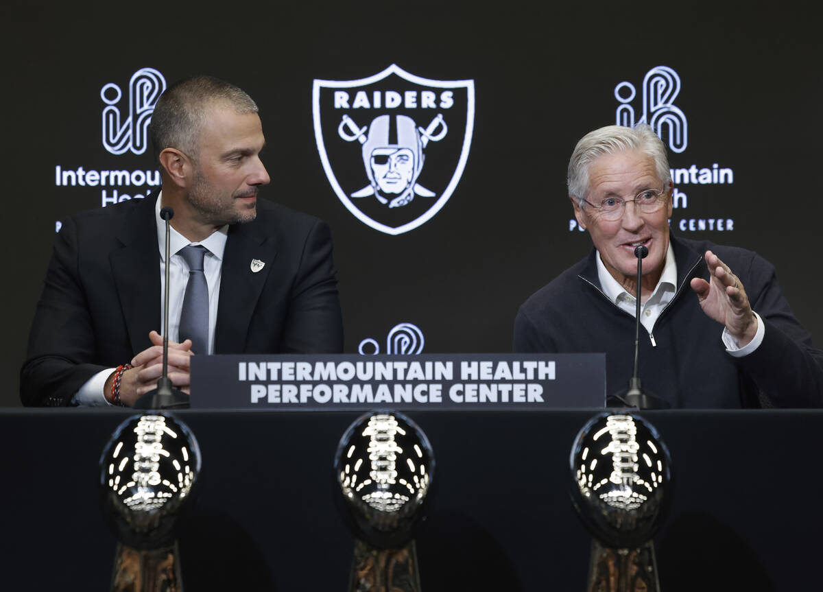 The new Raiders head coach Pete Carroll speaks as new general manager John Spytek looks on duri ...