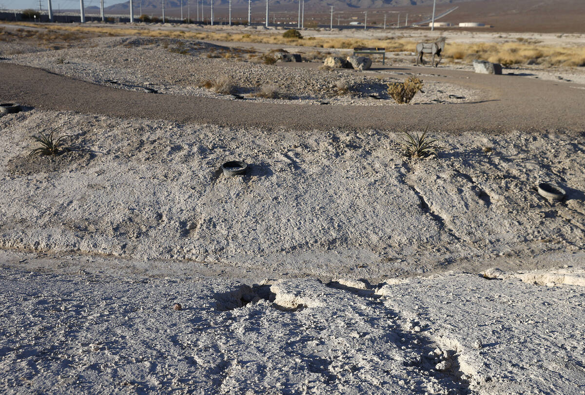 Soil erosion around a swale is seen at Tulip Spring State Park, on Wednesday, Jan. 29, 2025, in ...