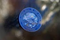 FILE - The Great Seal of the State of Nevada adorns the Nevada Legislature building in Carson C ...