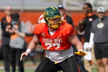 National team offensive lineman Grey Zabel of North Dakota State (77) runs through drills durin ...