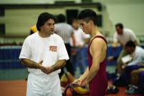 Eldorado wrestling coach Jimmy May with an athlete at a 1993 meet. (Las Vegas Review-Journal file)