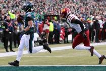 Philadelphia Eagles running back Saquon Barkley (26) scores a touchdown during the NFC Champion ...