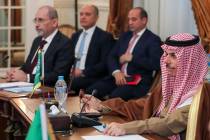 Jordan's foreign minister Ayman Safadi, left,and Saudi foreign minster Faisal bin Farhan attend ...