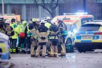 Emergency services at the scene of an incident at Risbergska School, in Örebro, Sweden, Tu ...