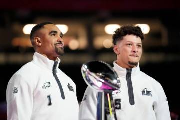 Philadelphia Eagles quarterback Jalen Hurts (1) and Kansas City Chiefs quarterback Patrick Maho ...