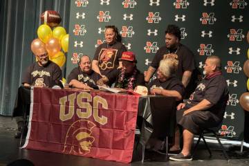 Mojave's AJ Tuitele signs his financial aid agreement (formerly letter of intent) with USC on W ...