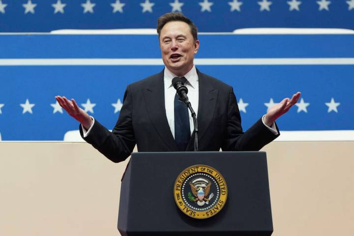 Elon Musk speaks at an indoor Presidential Inauguration parade event in Washington, Jan. 20, 20 ...