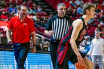 UNLV head coach Kevin Kruger has words for the referee after another no call against the Boise ...