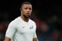 Philadelphia Eagles running back Saquon Barkley warms up before the NFL Super Bowl 59 football ...