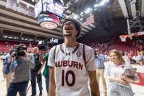 Auburn's Chad Baker-Mazara celebrates after a win over Alabama at an NCAA college basketball ga ...