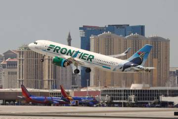 A Frontier airlines flight departs for takeoff at Harry Reid International Airport in Las Vegas ...