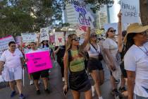 Pro-abortion marchers travel on Las Vegas Boulevard during rally for women’s rights at the Be ...