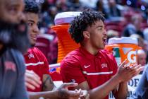 UNLV guard Dedan Thomas Jr. (11) cheers for his teammates from the bench against the Colorado S ...