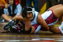 Centennial’s Sandilynn Paopao pins Desert Oasis’ Noelani Almogela during their 14 ...