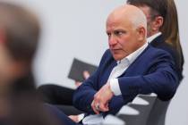 Marc Badain, president of the Athletics, sits in on a meeting during a Las Vegas Stadium Author ...