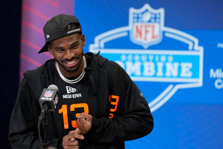 Colorado quarterback Shedeur Sanders speaks during a press conference at the NFL football scout ...