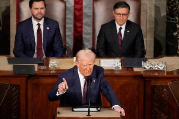 President Donald Trump speaks as Vice President JD Vance, left, and House Speaker Mike Johnson ...