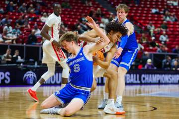 Rebels forward Jalen Hill (1) gets caught up with Air Force Falcons forward Will Cooper (6) whi ...